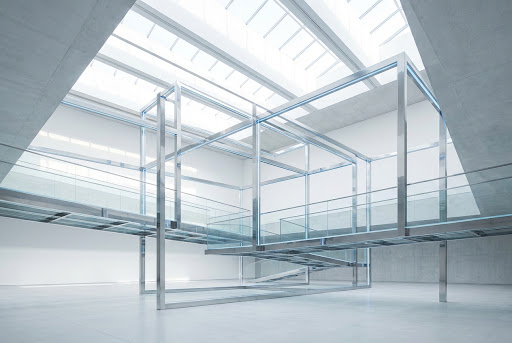 Interconnected glass and steel structures representing enterprise alignment and institutional interdependence